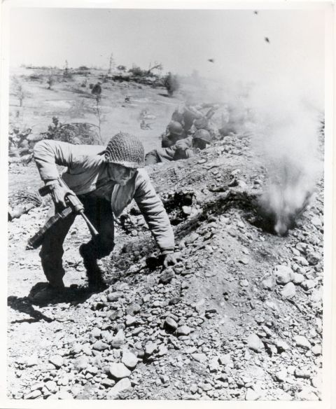 Reese (McQueen) advances through the battlefield.